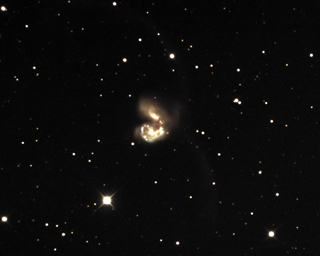 Click to view larger astrophoto. Antennae Galaxies