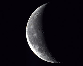 Click to view larger astrophoto. Third Quarter Moon