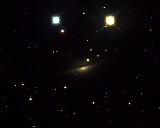 Click to view larger astrophoto. NGC1055