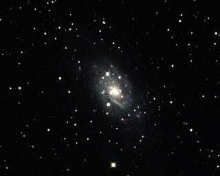 Click to view larger astrophoto. NGC 2403
