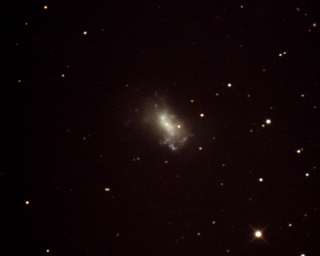 Click to view larger astrophoto. NGC4449