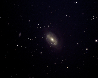 Click to view larger astrophoto. NGC4725 and NGC4712